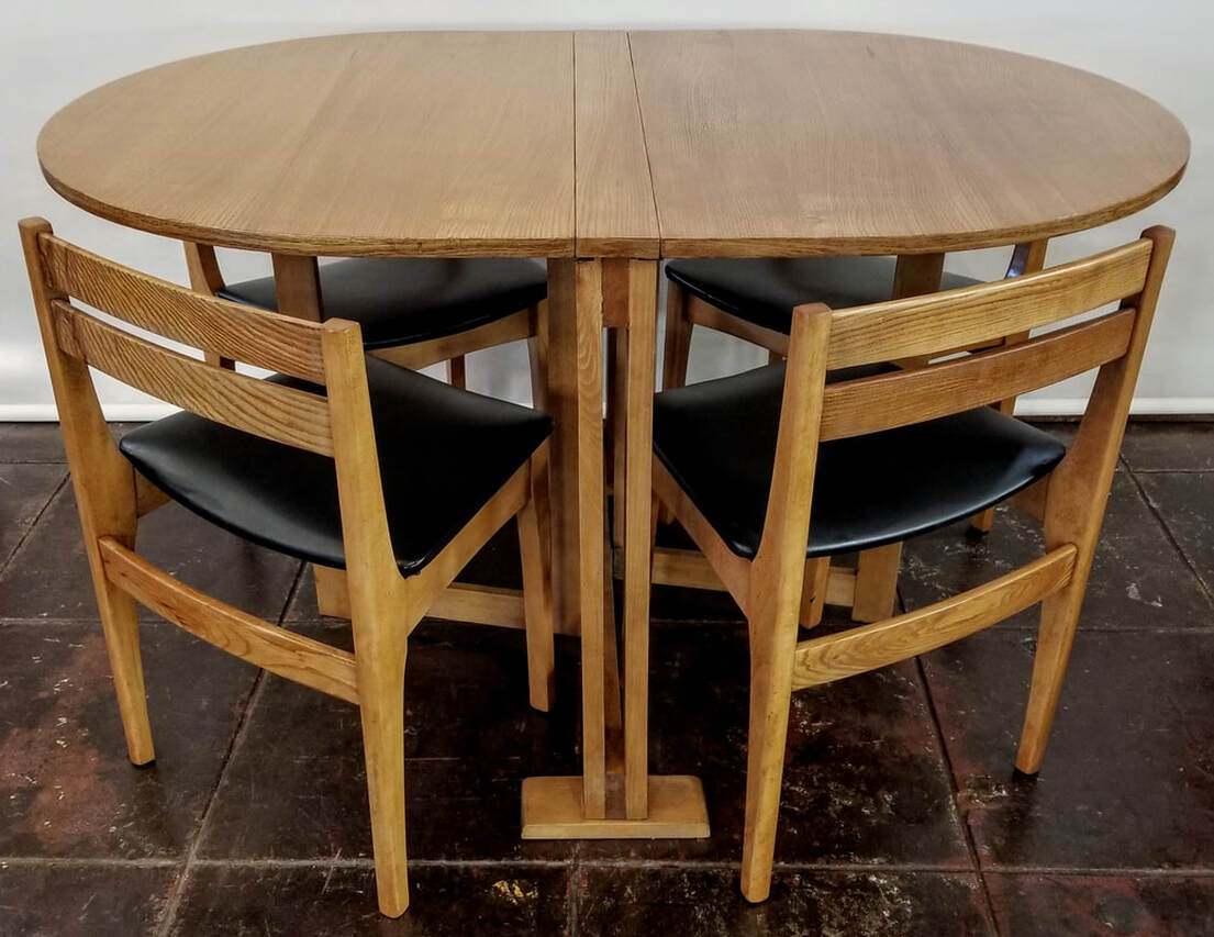 Teak Dining Table and Chairs | Vintage Norwegian Modern  Compact table and chairs are excellent options for small space living. The gateleg drop-leaf table takes up just 9