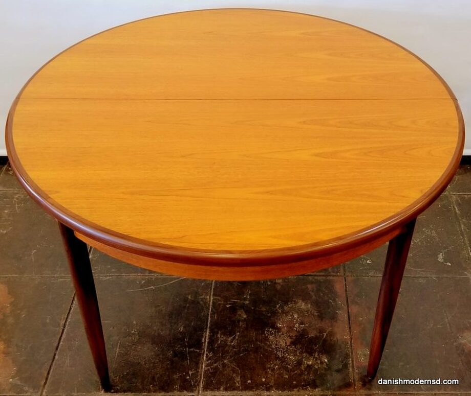 Round to oval dining table #4385 designed by Victor Bramwell Wilkins for E. Gomme's G-Plan Fresco range. Offered in the